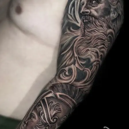 Poseidon full sleeve tattoo in black and grey realism, done at Blesink Tattoo Porto